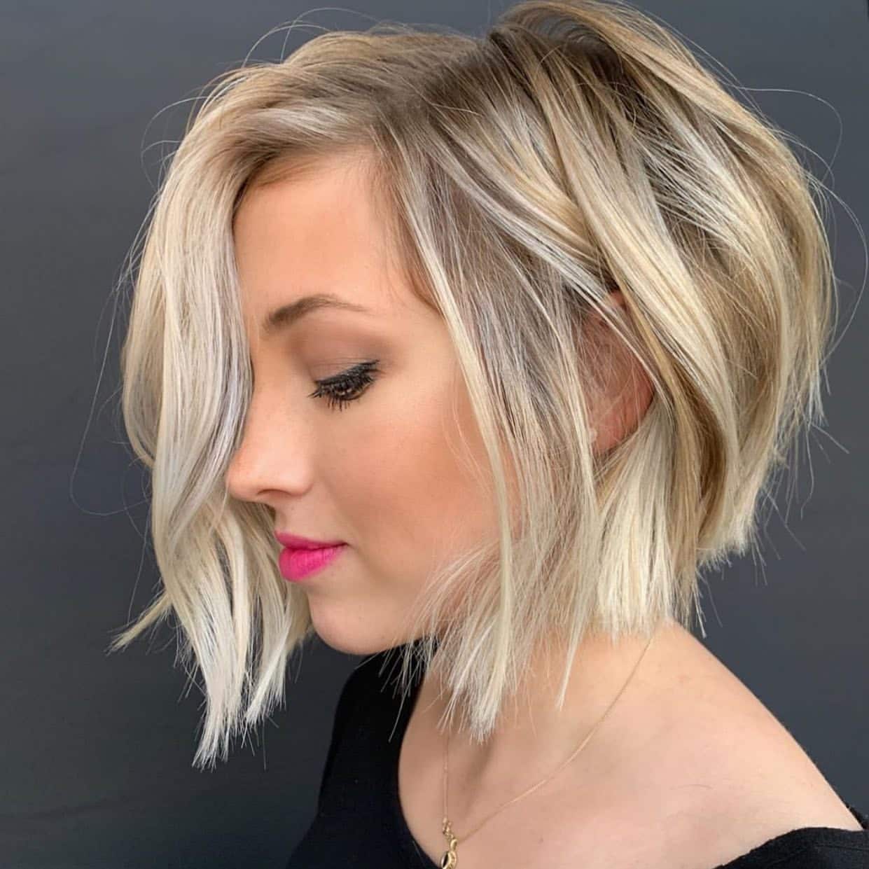 22. Platinum Blonde Textured Angled Bob - Angled Bob Hairstyles