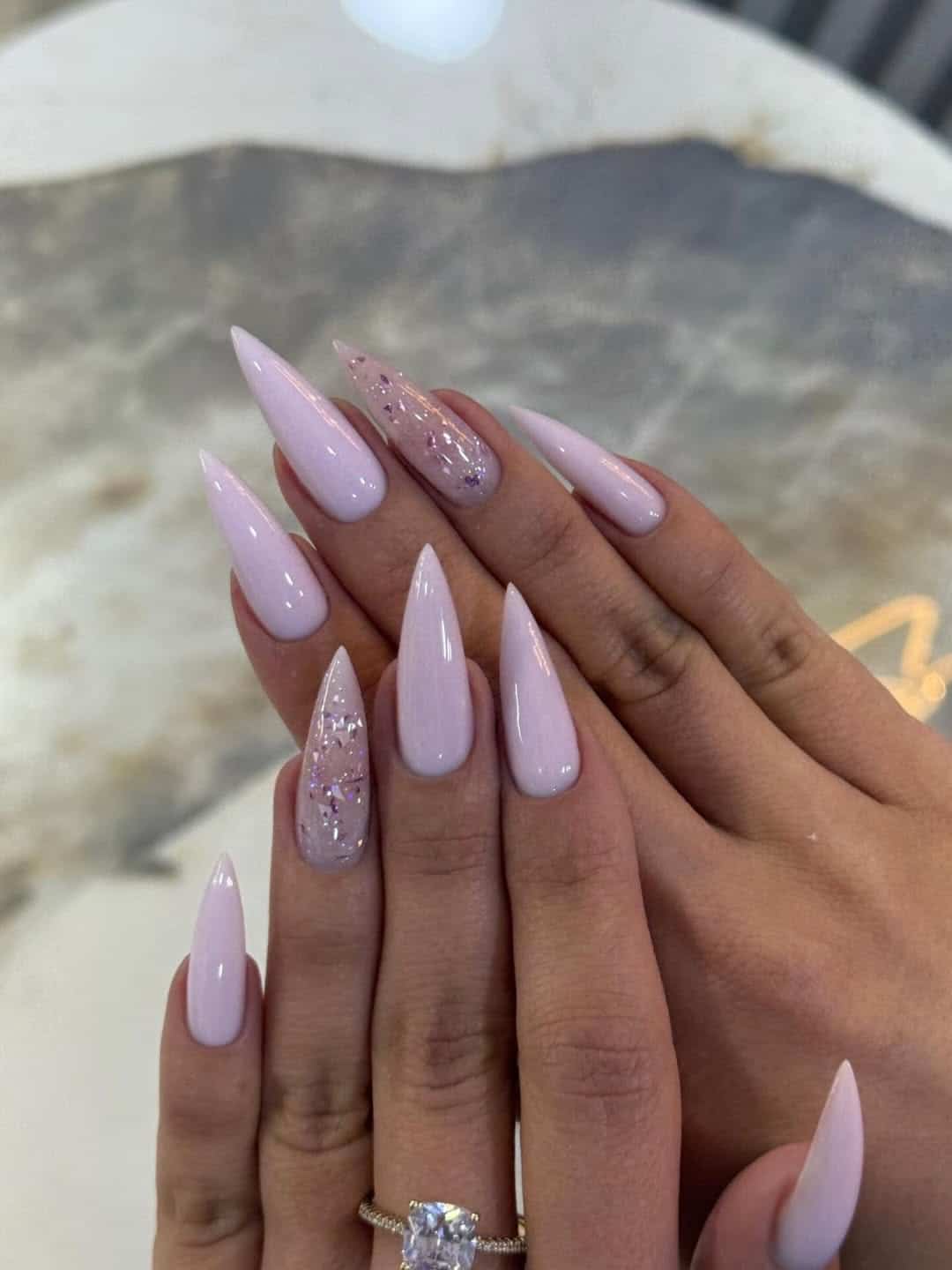 4. Pastel Lilac Glitter Stiletto Nails - nail ideas for long nails