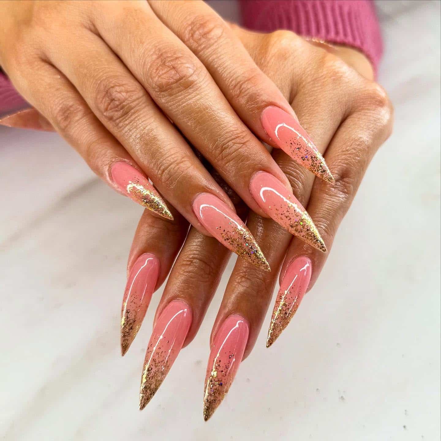 7. Coral Pink and Gold Glitter Stiletto Nails - nail ideas for long nails