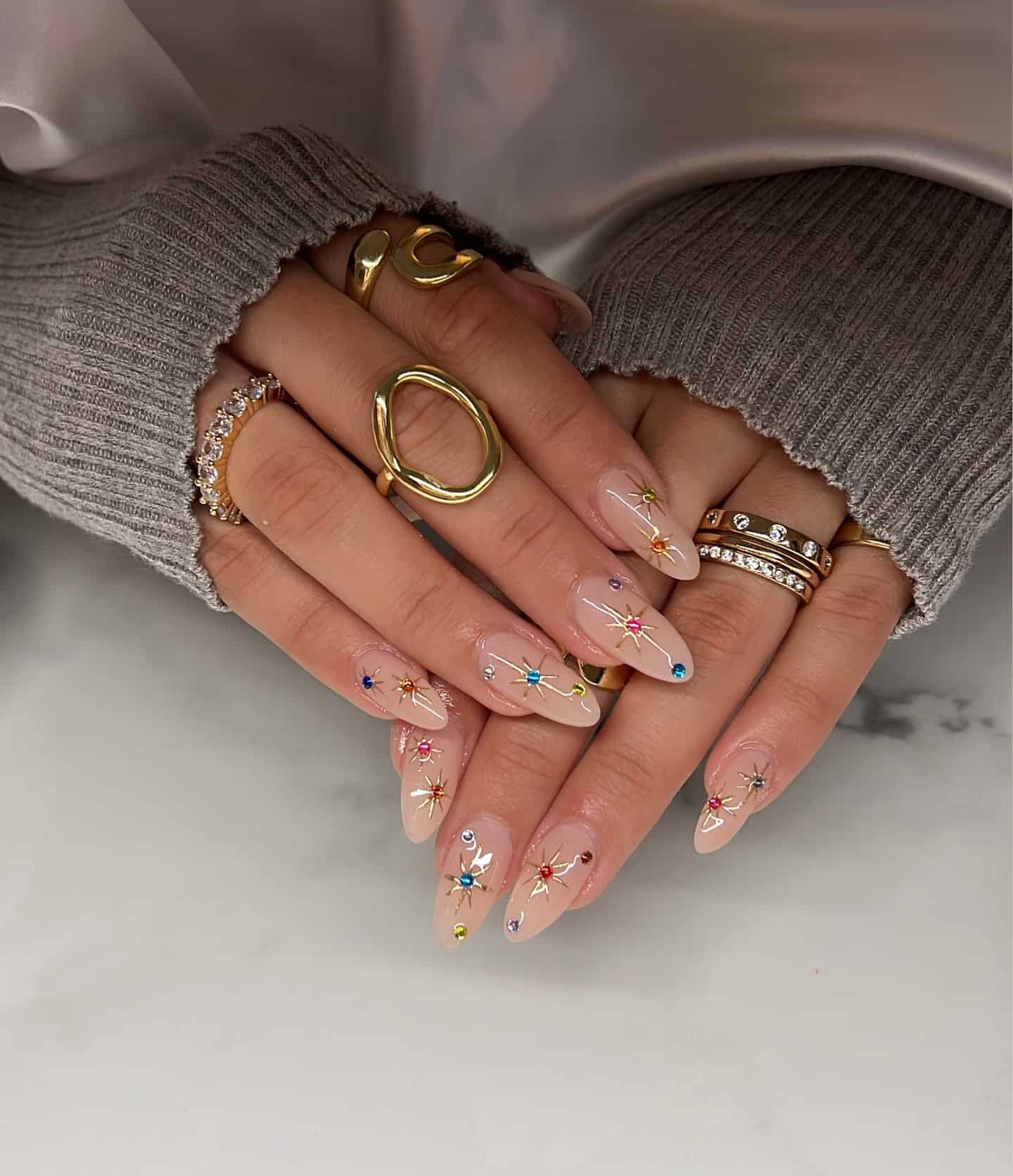 13. Nude Multicolor Gem Almond Nails - nail ideas for long nails