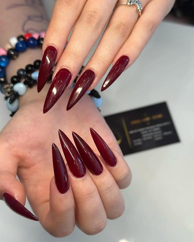 19. Deep Burgundy Stiletto Nails - nail ideas for long nails