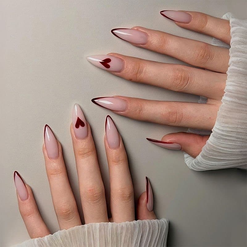 22. Nude and Burgundy Heart Stiletto Nails - nail ideas for long nails
