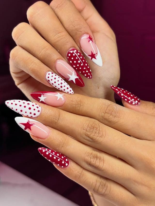 7. Red and White Star Stiletto Nails - red and white nail ideas
