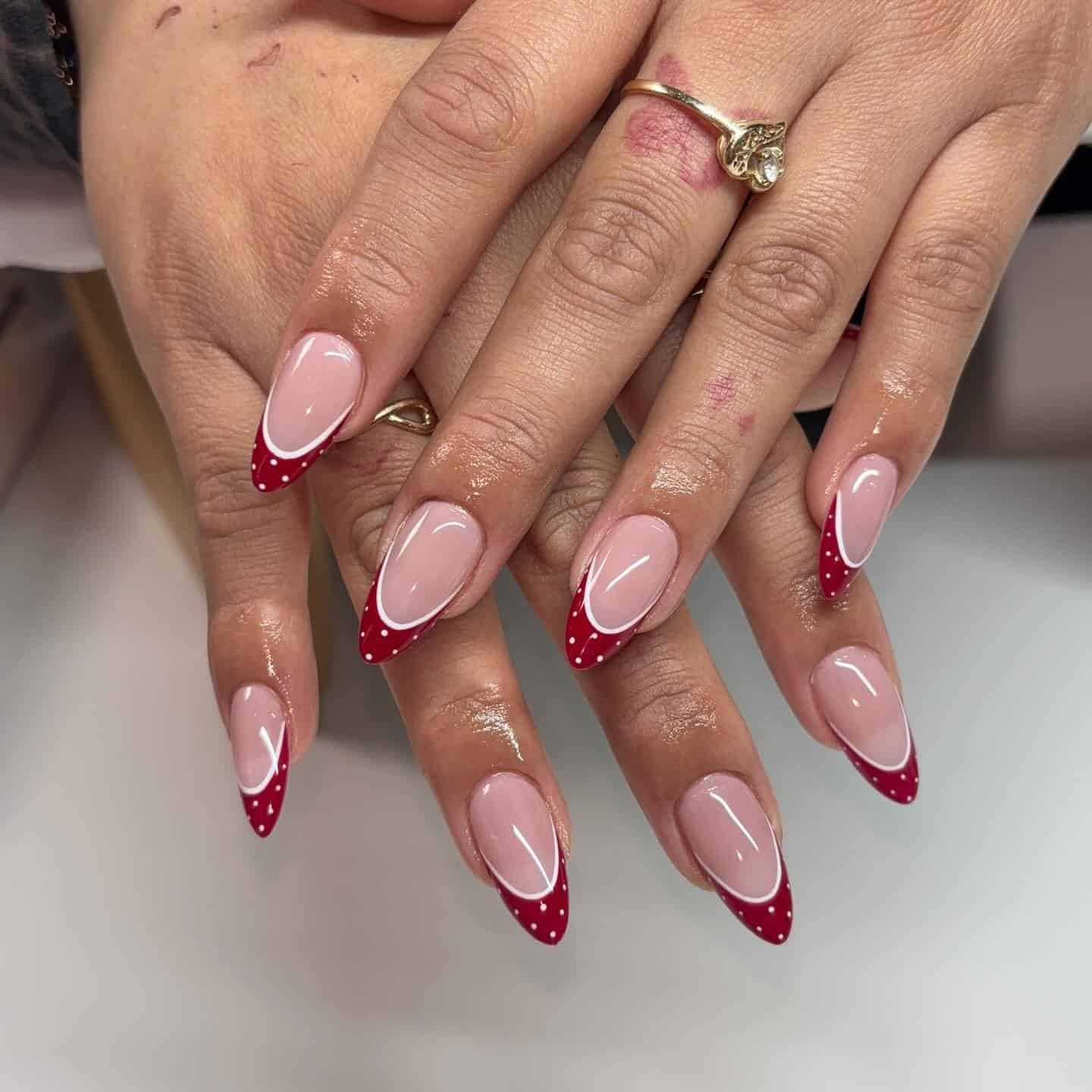 8. Red Polka Dot Micro French Almond Nails - red and white nail ideas