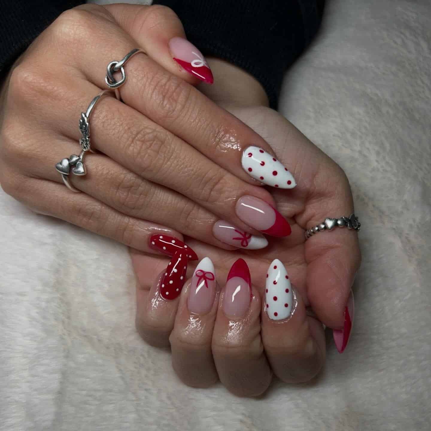11. Red and White Bow Polka Dot Almond Nails - red and white nail ideas