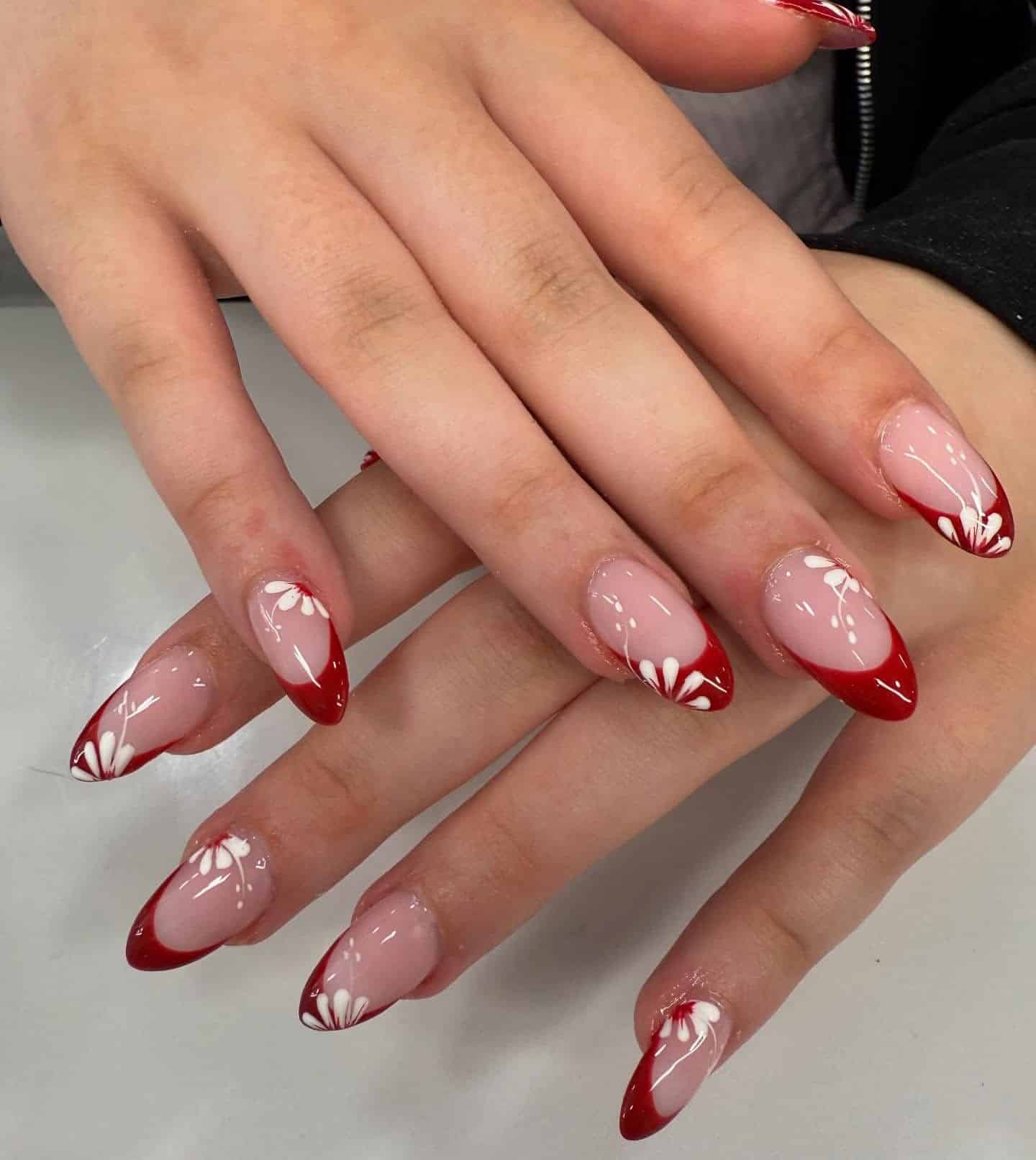 19. Red Floral French Almond Nails - red and white nail ideas