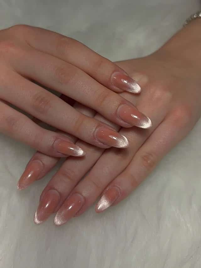 2. Soft Rose Gold French Almond Nails - rose gold nail ideas