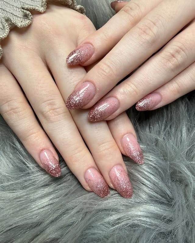 10. Rose Gold Glitter Ombre Almond Nails - rose gold nail ideas