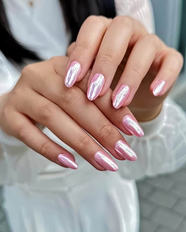 20. Pearlescent Pink Rose Gold Chrome Almond Nails - rose gold nail ideas