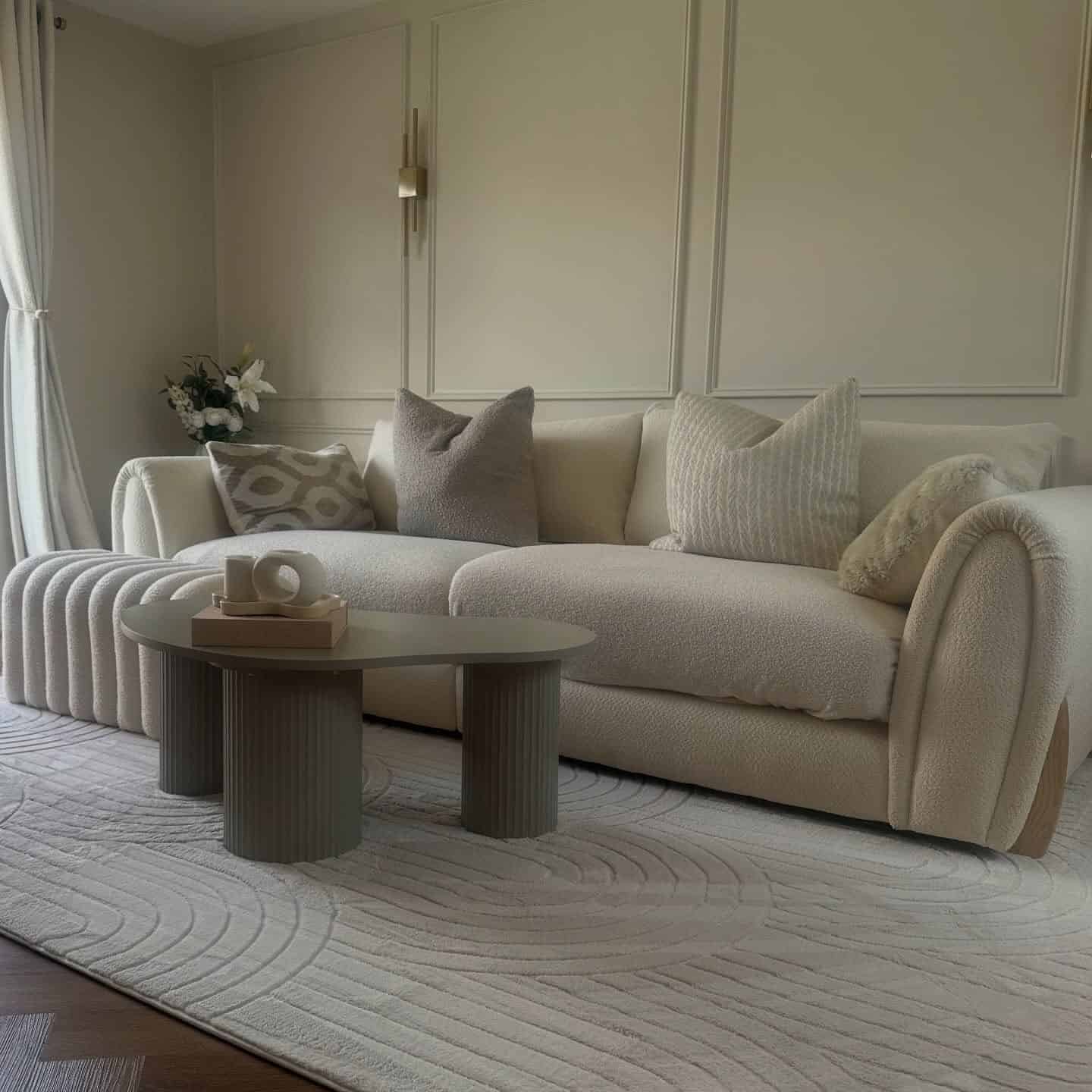 6. Ivory Sculptural Rug Living Room Idea - jure rug living room ideas