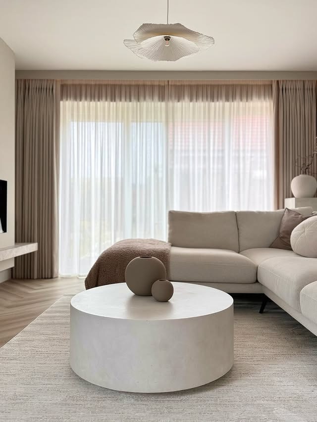 13. Light Greige Minimalist Rug Living Room Idea - jure rug living room ideas