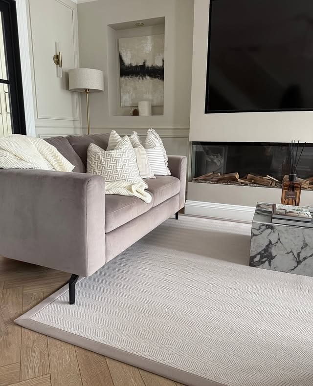 15. Pale Gray Herringbone Rug Living Room Idea - jure rug living room ideas