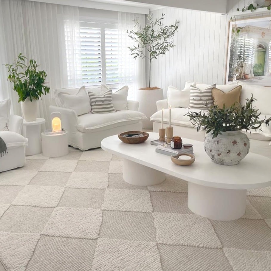 21. Ivory Checkerboard Rug Living Room Idea - jure rug living room ideas
