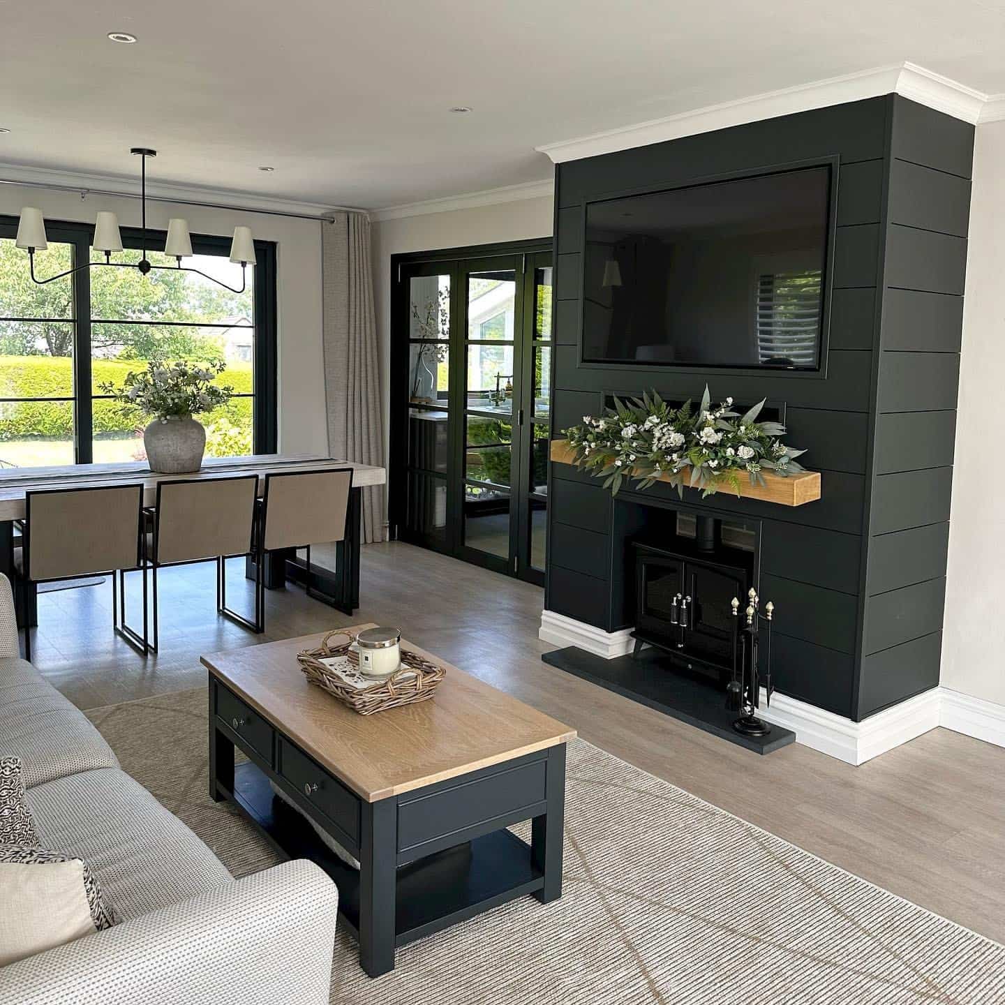 1. Black Feature Wall and Soft Grey Living Room Idea - black and grey living room ideas