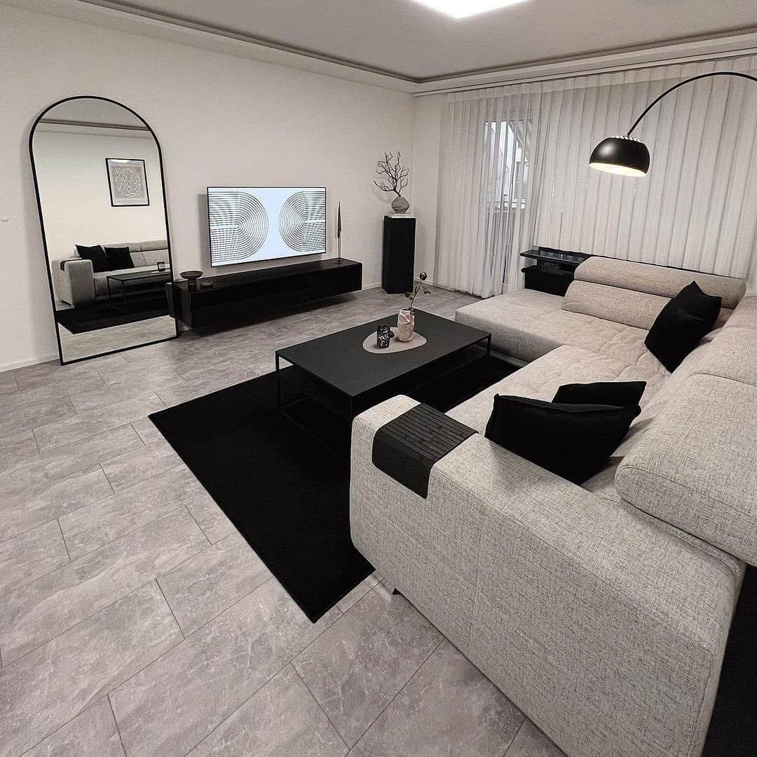 17. Black Rug and Light Grey Living Room Idea - black and grey living room ideas