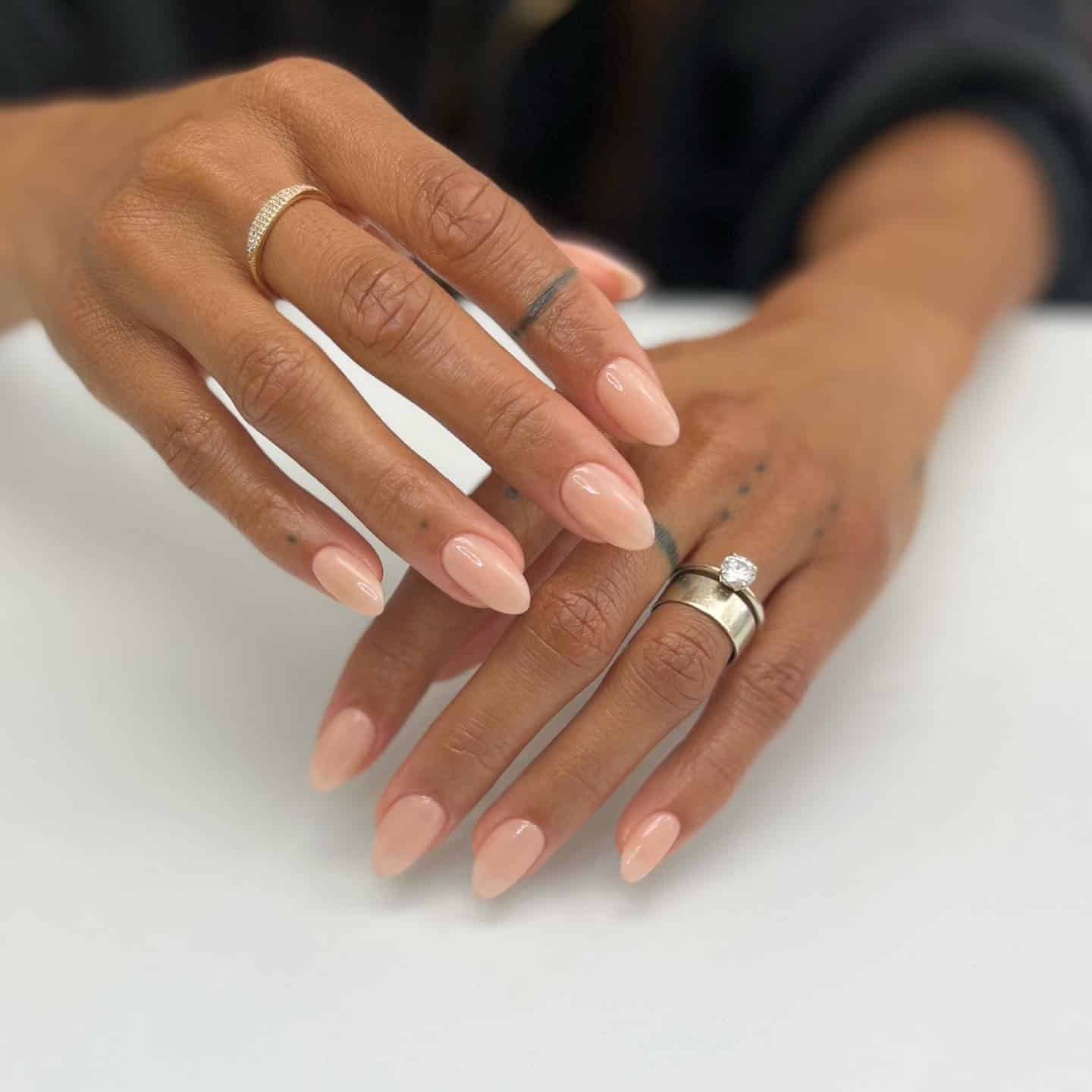 17. Peachy Nude Round Nails - round nail ideas