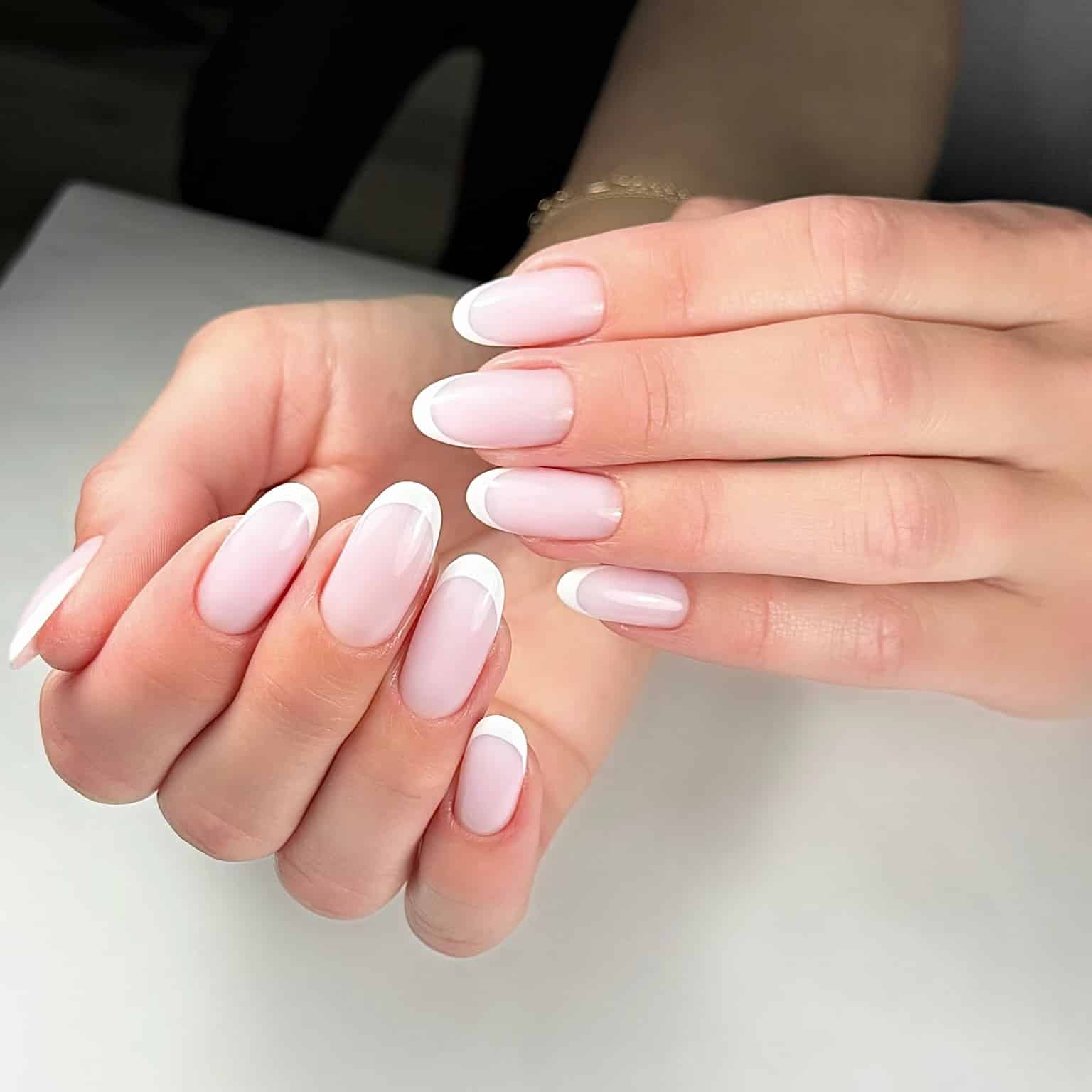 18. Milky Pink and White French Round Nails - round nail ideas