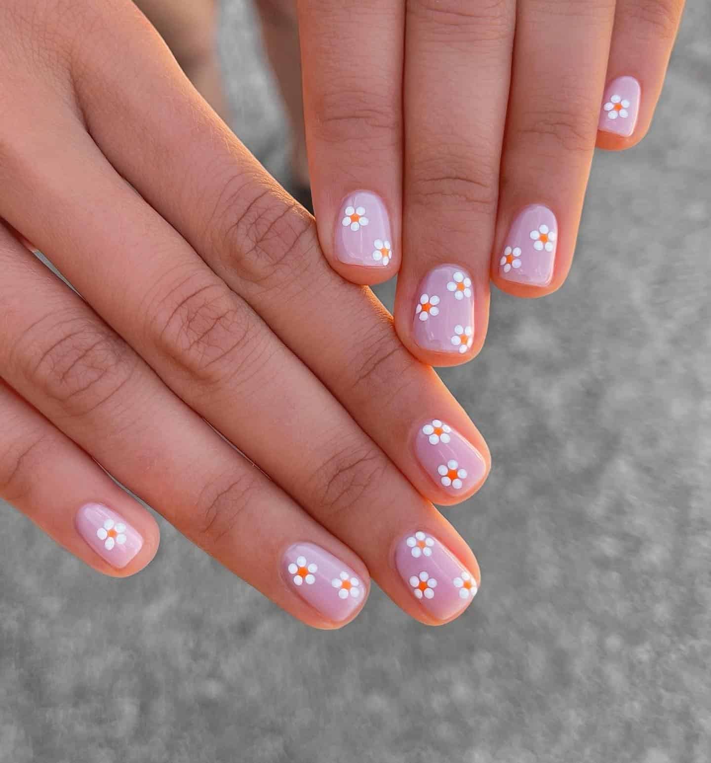 5. Lilac Daisy Short Nails - simple flower nail ideas
