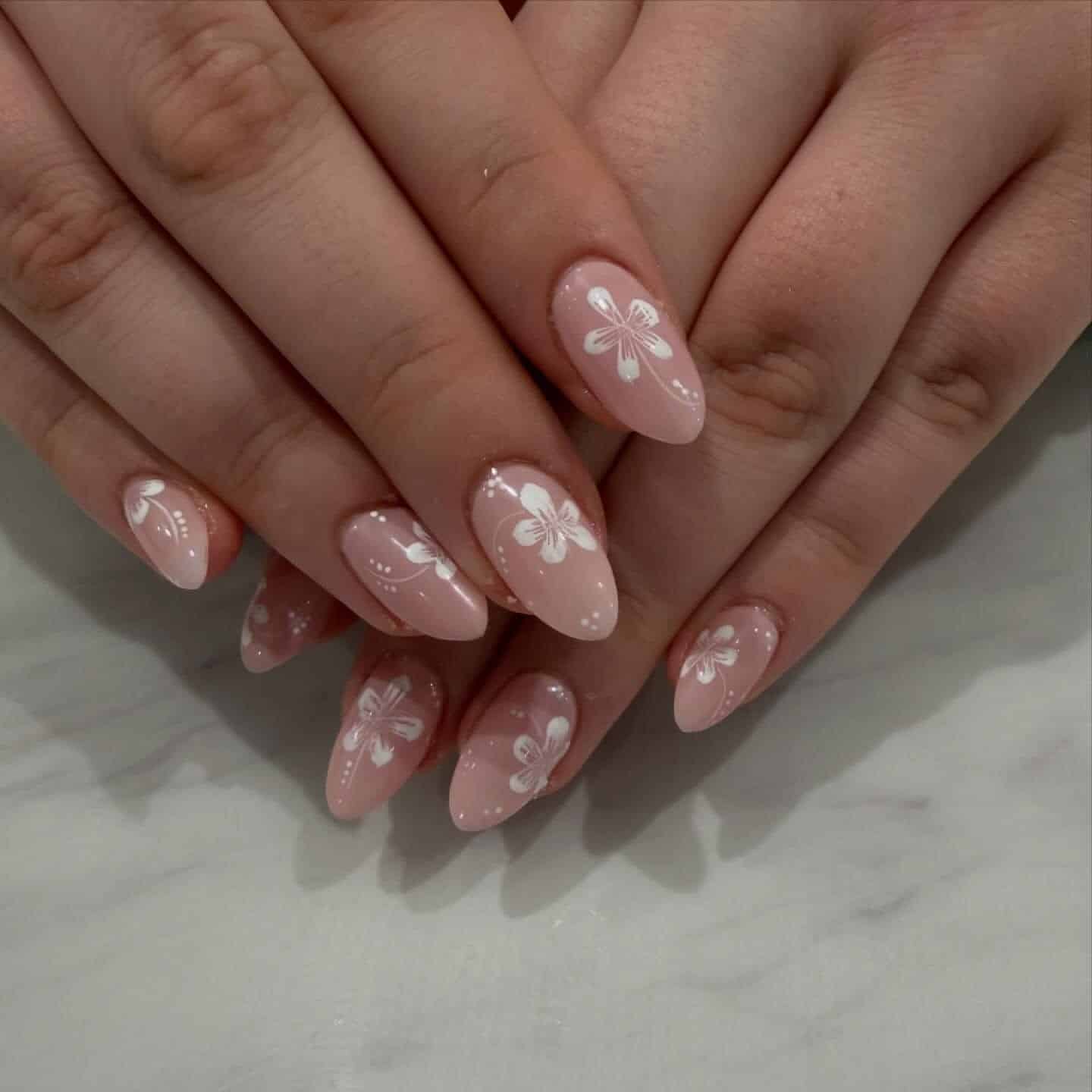 6. Blush Pink White Floral Almond Nails - simple flower nail ideas