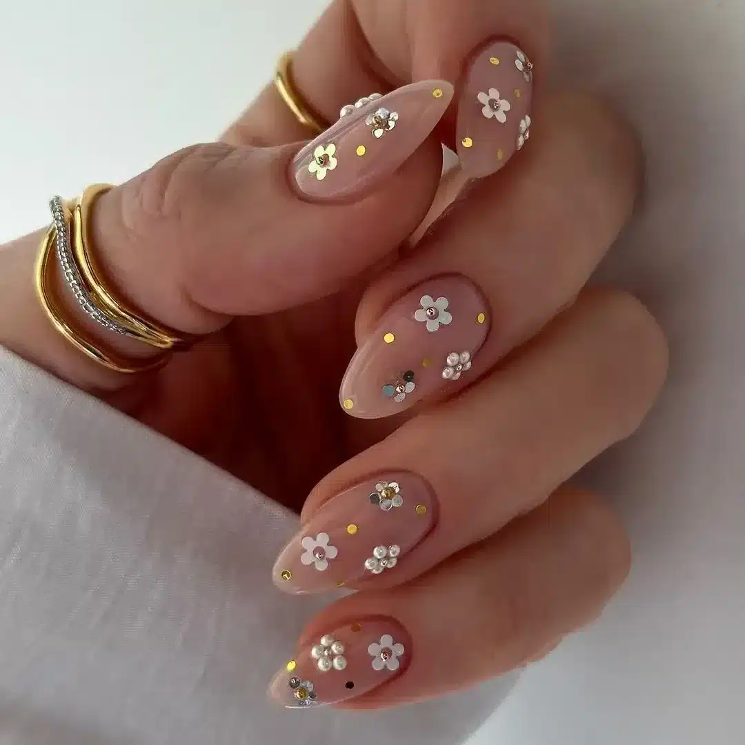 13. Nude Gold Floral Embellished Almond Nails - simple flower nail ideas