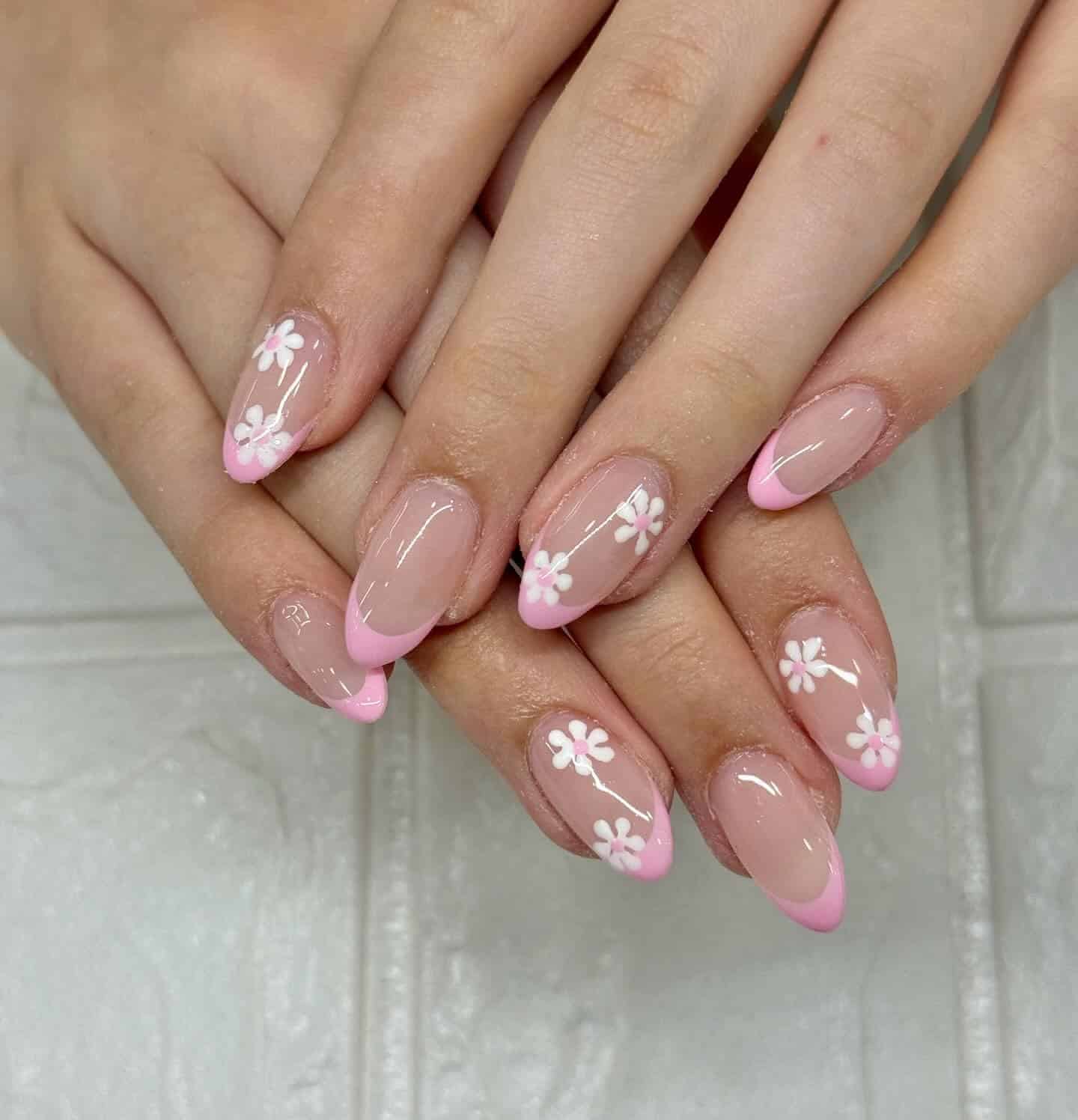 22. Pink French Daisy Almond Nails - simple flower nail ideas