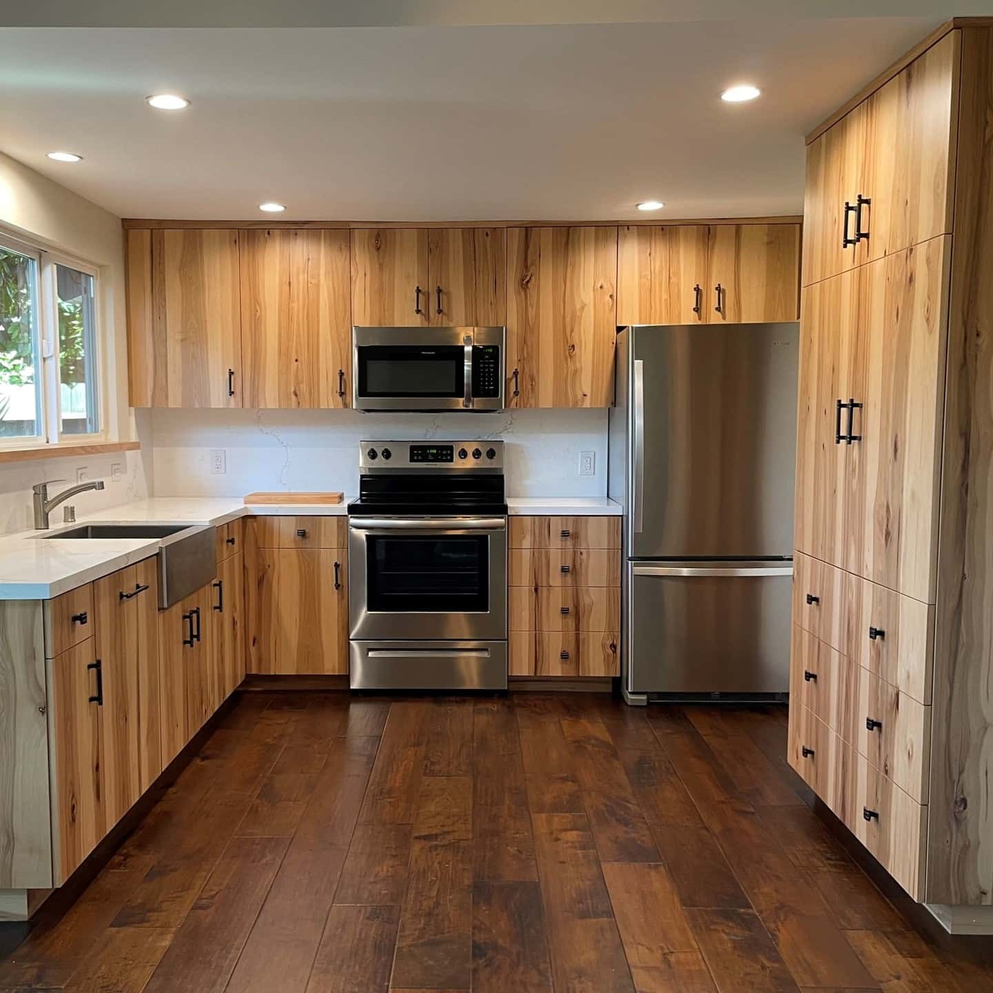 11. Natural Hickory Cabinets with Deep Walnut Floors - hickory kitchen cabinet ideas
