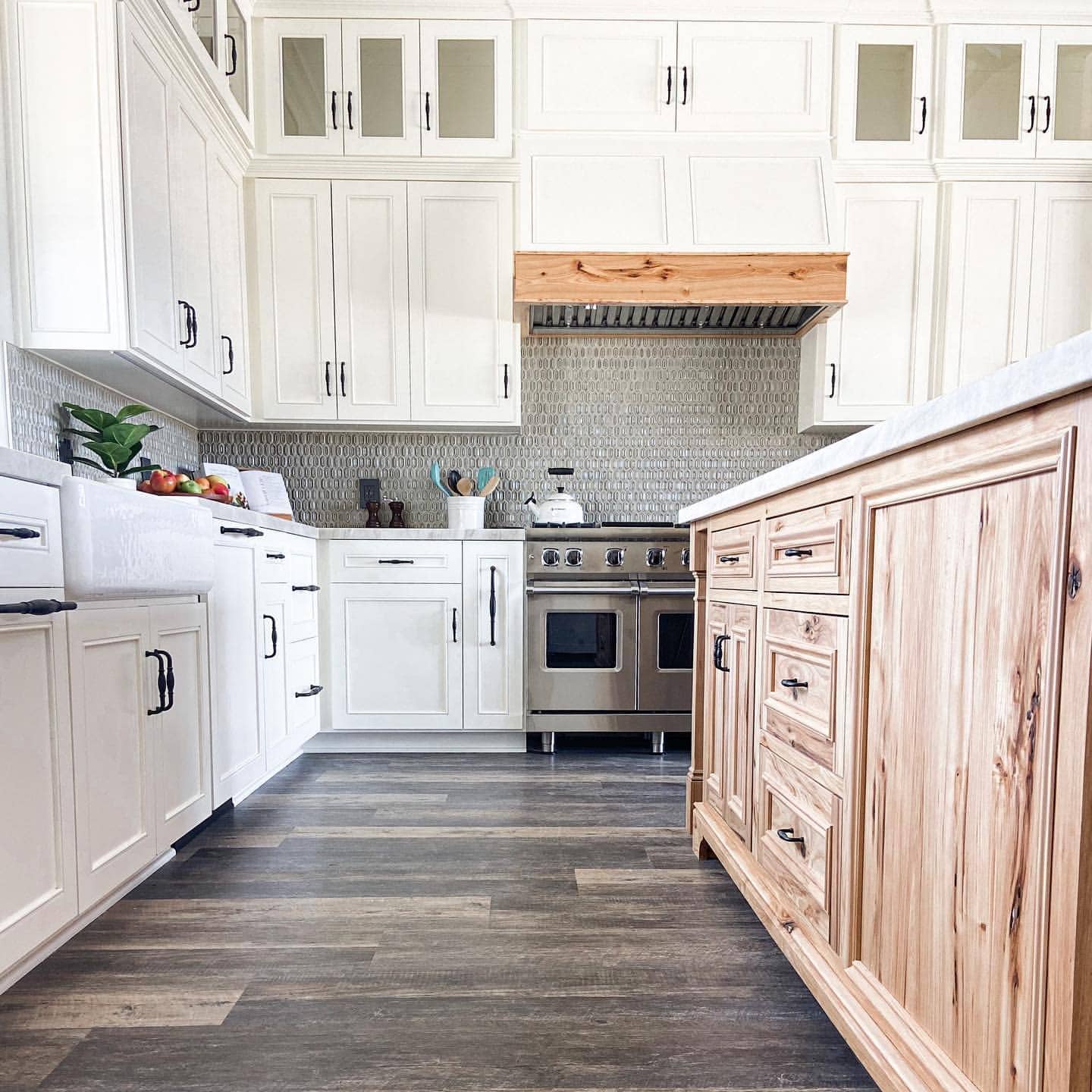 12. White Kitchen with Natural Hickory Island - hickory kitchen cabinet ideas