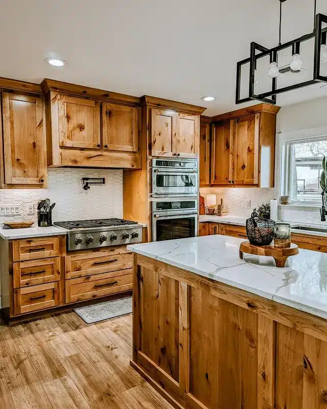 17. Amber Hickory Cabinets with Bright White Quartz - hickory kitchen cabinet ideas