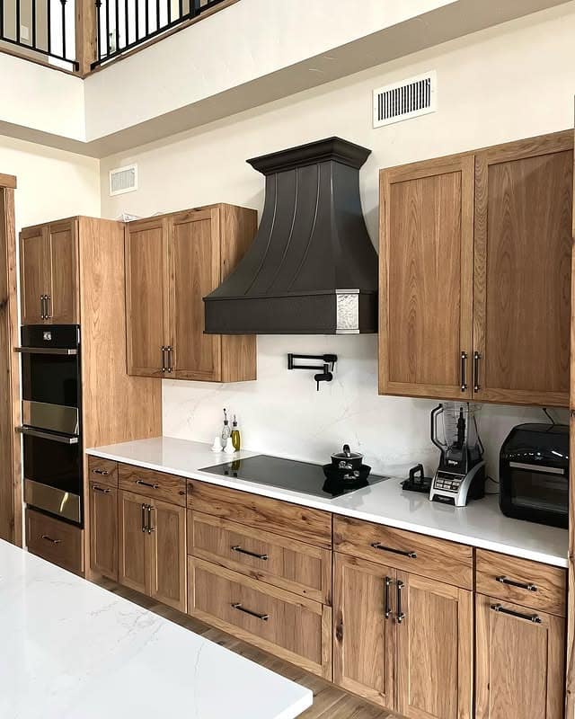 20. Medium Hickory Cabinets with Matte Black - hickory kitchen cabinet ideas