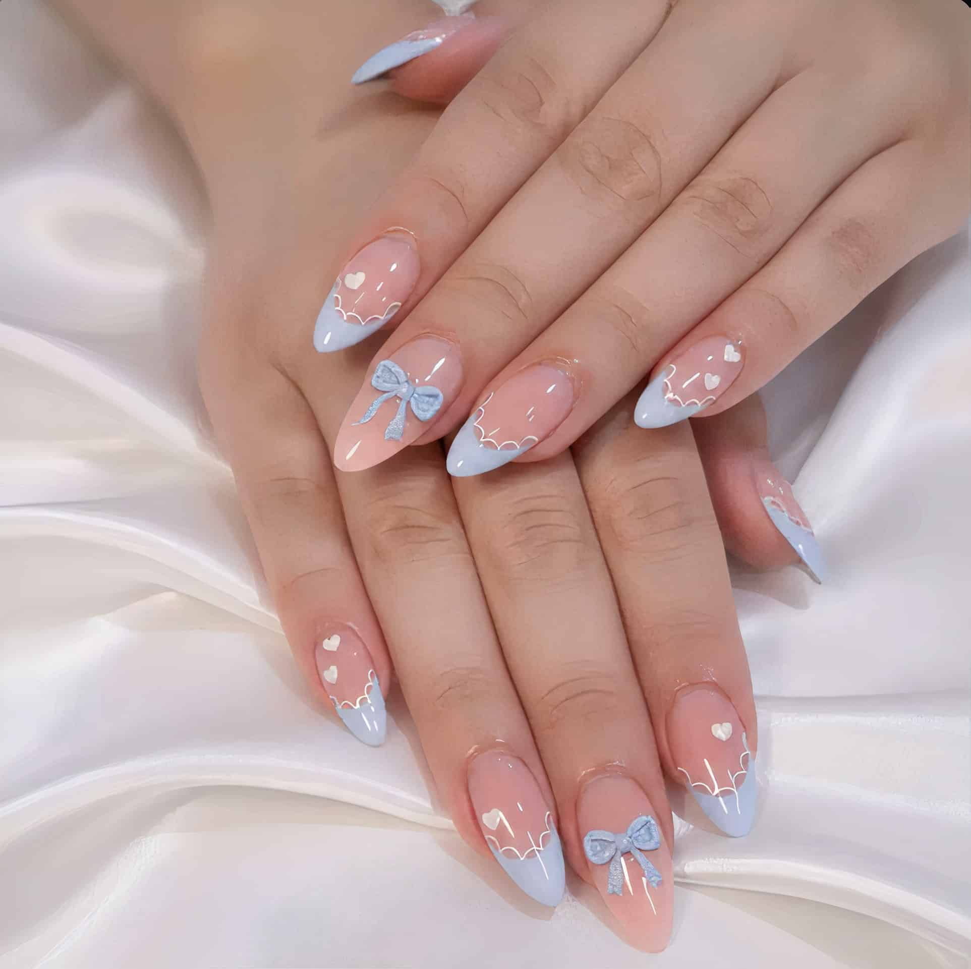 3. Baby Blue Bow and Heart Almond Nails - baby blue nail ideas