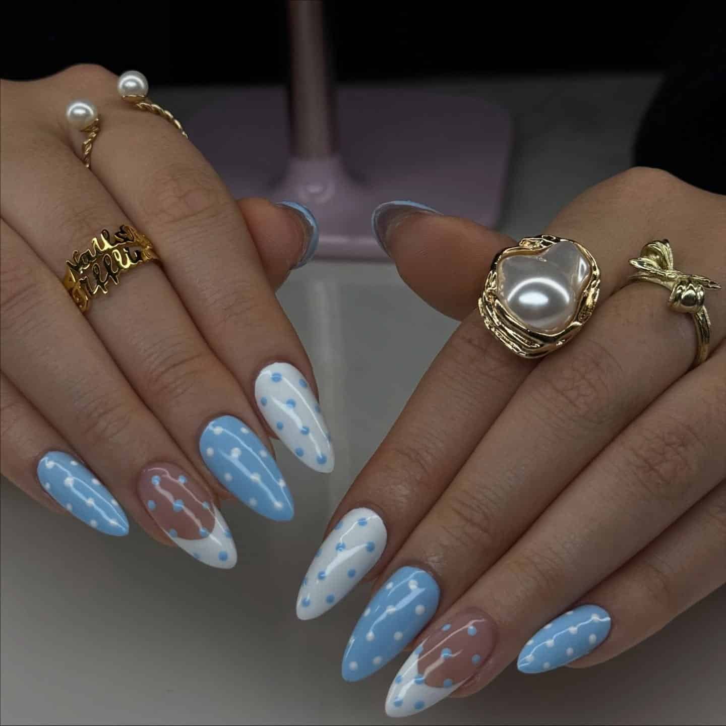 4. Baby Blue Polka Dot Almond Nails - baby blue nail ideas