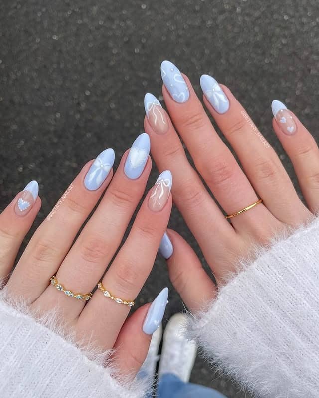 5. Baby Blue Coquette Bow Almond Nails - baby blue nail ideas