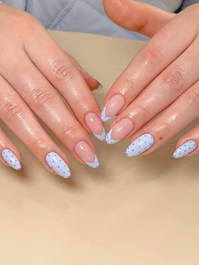 9. Baby Blue Dotted French Oval Nails - baby blue nail ideas