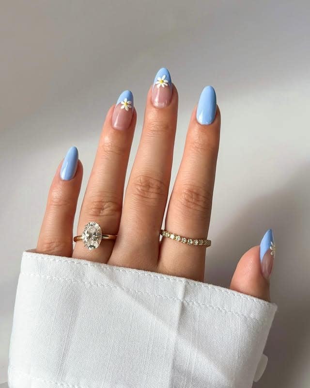 15. Baby Blue Daisy French Almond Nails - baby blue nail ideas