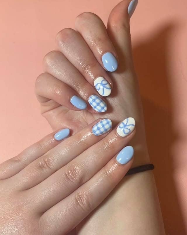 22. Baby Blue Gingham Bow Oval Nails - baby blue nail ideas