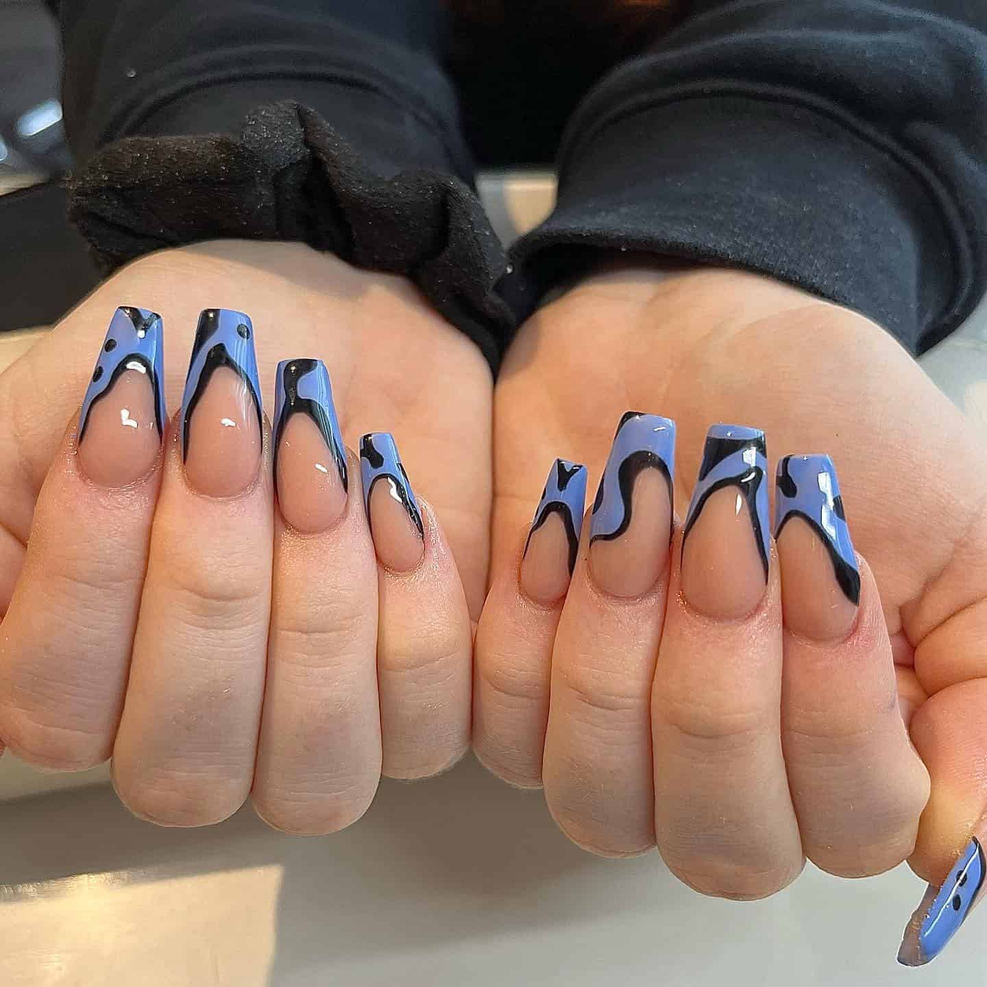 8. Periwinkle Blue and Black Drip Coffin Nails - black and blue nail ideas