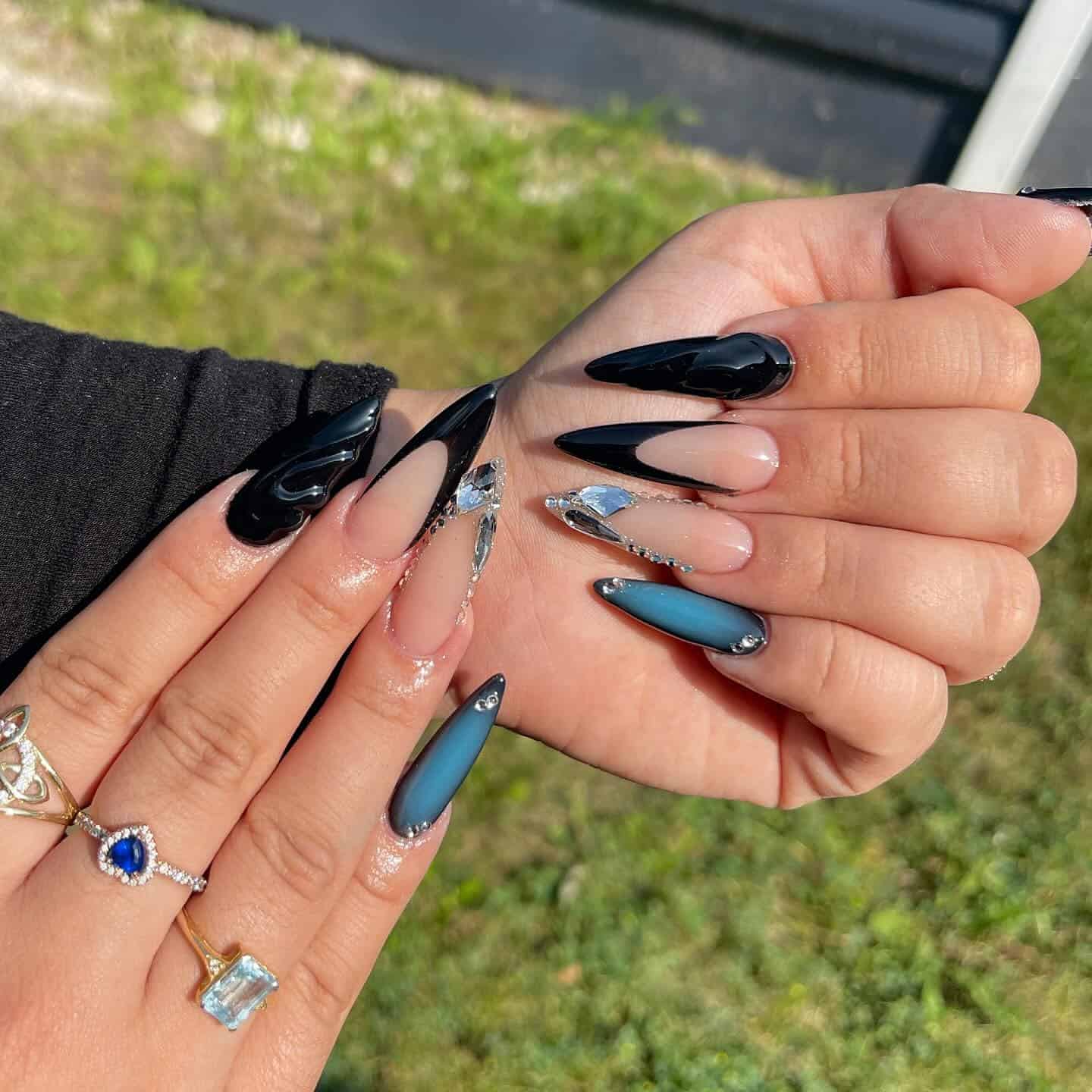 10. Black and Smoky Blue Rhinestone Stiletto Nails - black and blue nail ideas