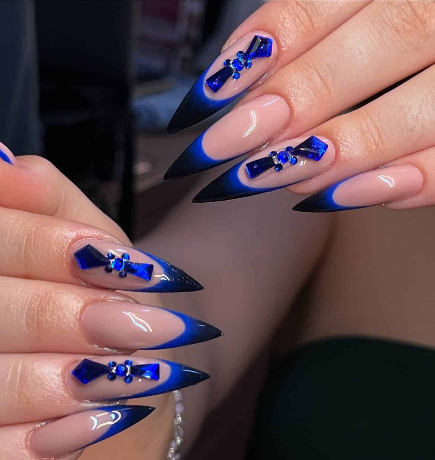 21. Black and Cobalt Blue Rhinestone Stiletto Nails - black and blue nail ideas