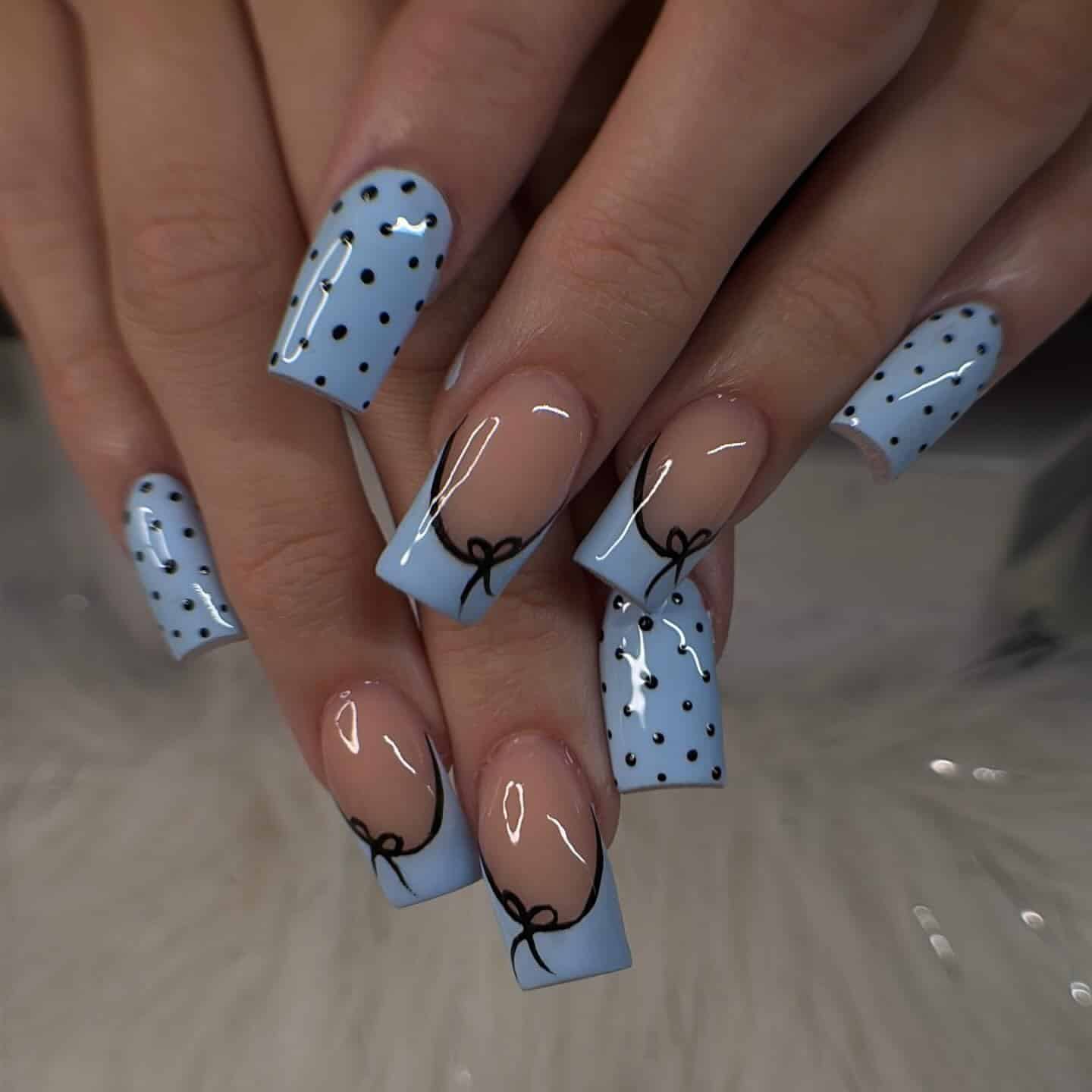 22. Baby Blue and Black Bow Square Nails - black and blue nail ideas