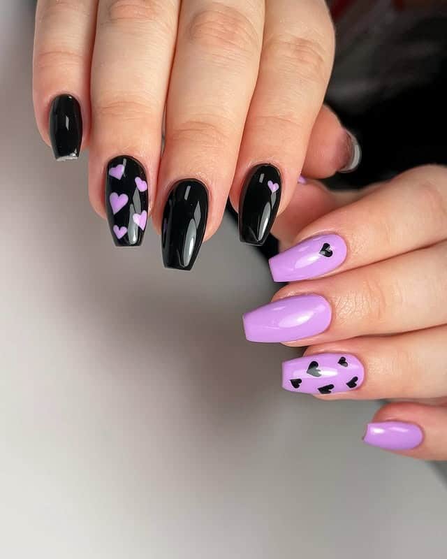 3. Black and Lavender Coffin Nails with Heart Accents - black and purple nail ideas