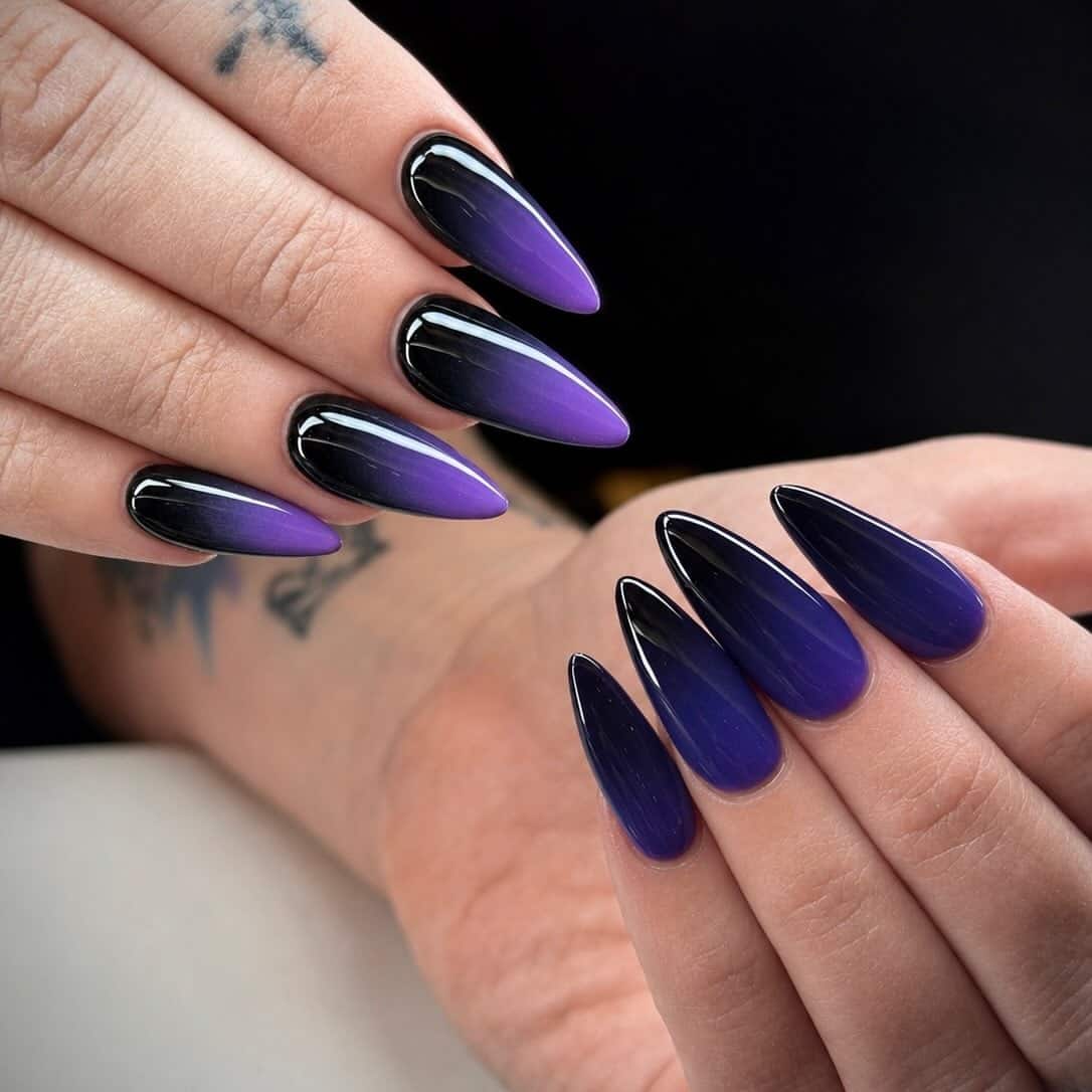 5. Black-to-Purple Ombre Stiletto Nails - black and purple nail ideas