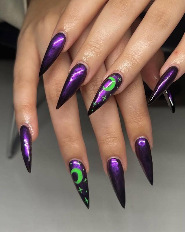 10. Metallic Purple Stiletto Nails with Neon Celestial Art - black and purple nail ideas