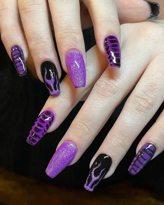 16. Purple Glitter Coffin Nails with Black Flame Art - black and purple nail ideas