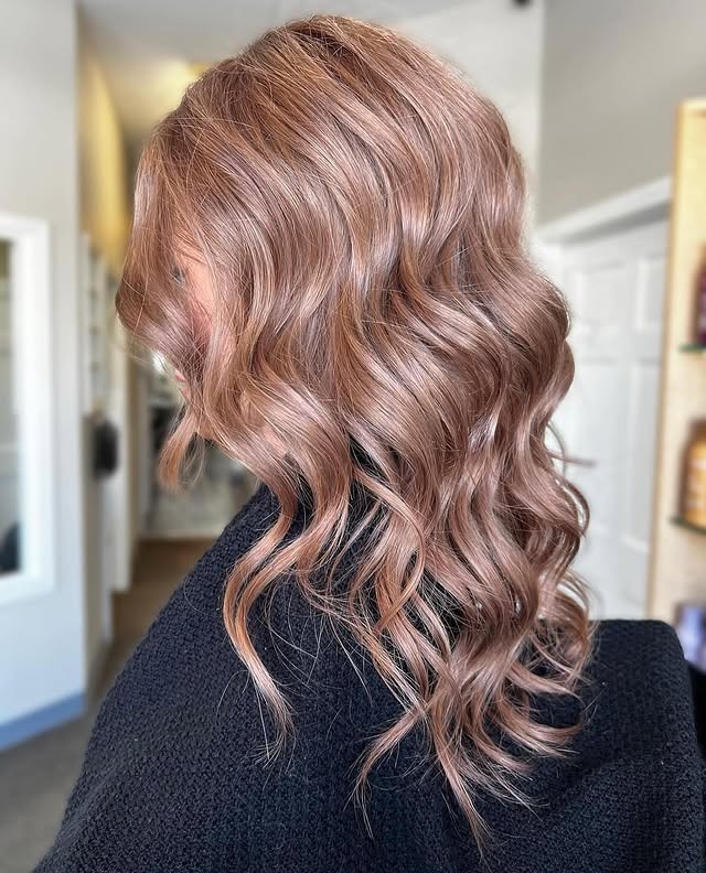 6. Smoky Rose Gold Loose Curls - Rose Gold Hair Color
