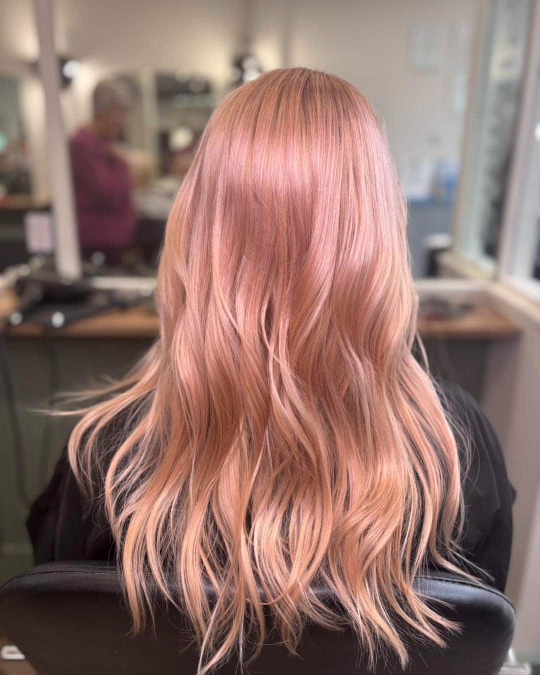 22. Peach Rose Gold Long Layered Waves - Rose Gold Hair Color