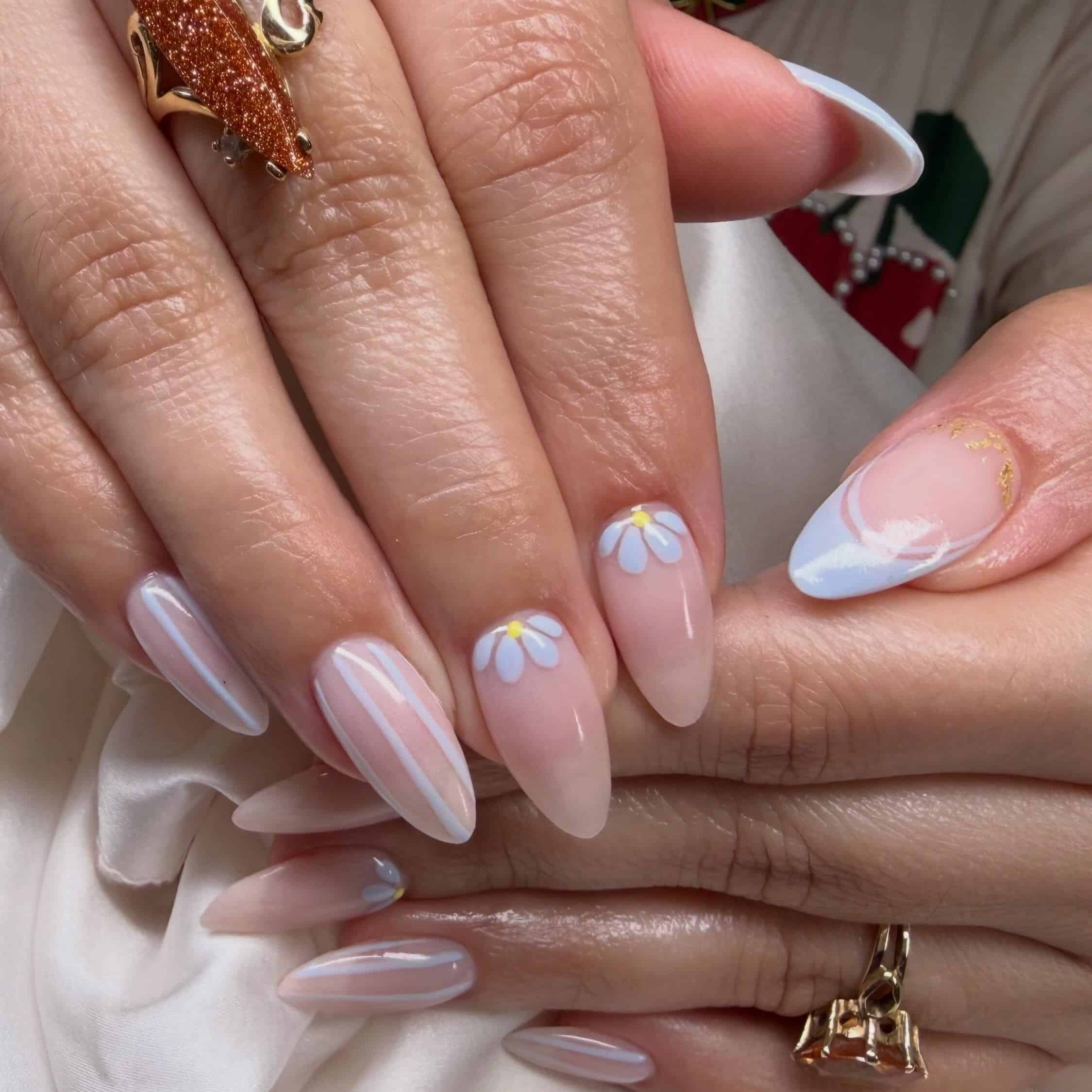 21. Blush Pink and Baby Blue Floral Almond Dip Nails - dip powder nail ideas