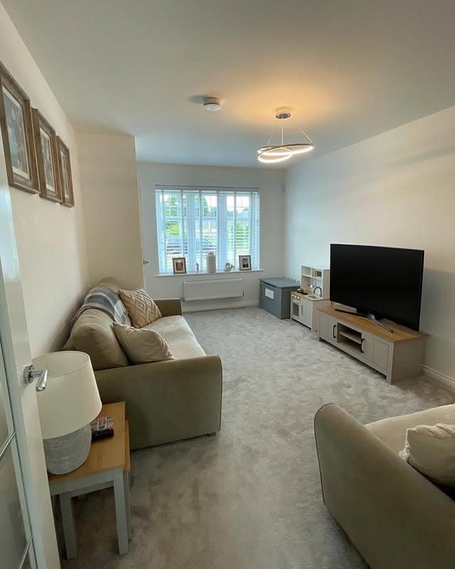 15. Soft Greige and Light Gray Simple Long Living Room Idea - long living room ideas