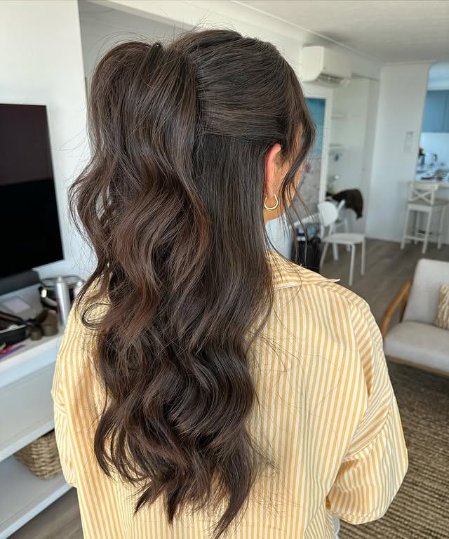 2. Chocolate Brown Wavy High Ponytail - Long Hairstyles for Women