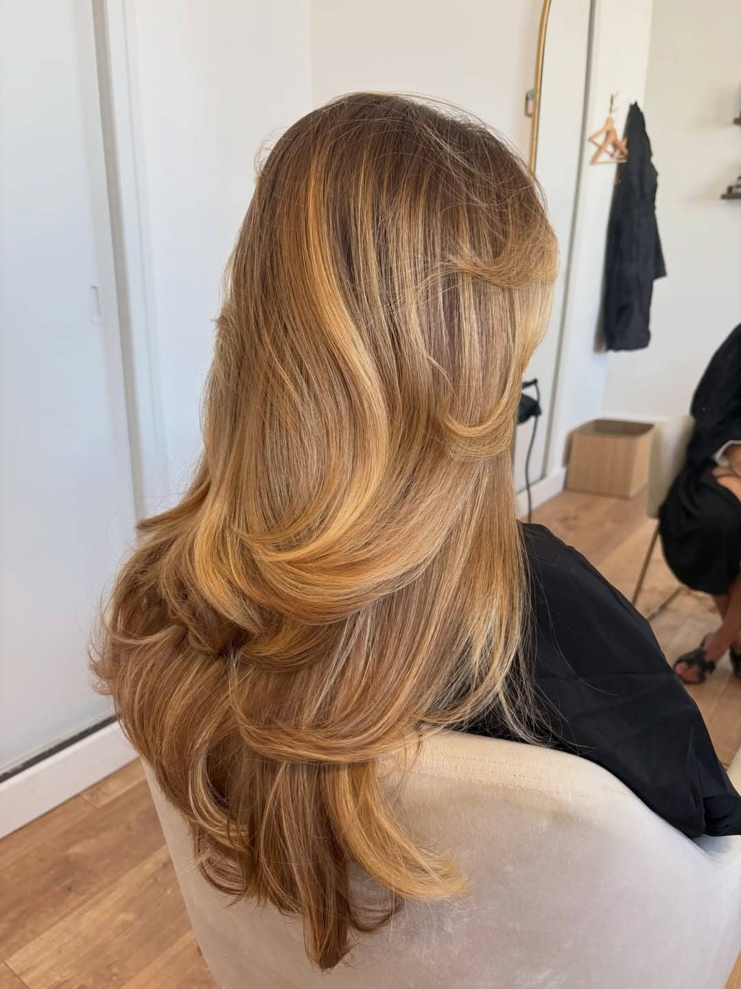 6. Caramel Honey Blonde Butterfly Layers with Fine Highlights - Honey Blonde Hair with Highlights