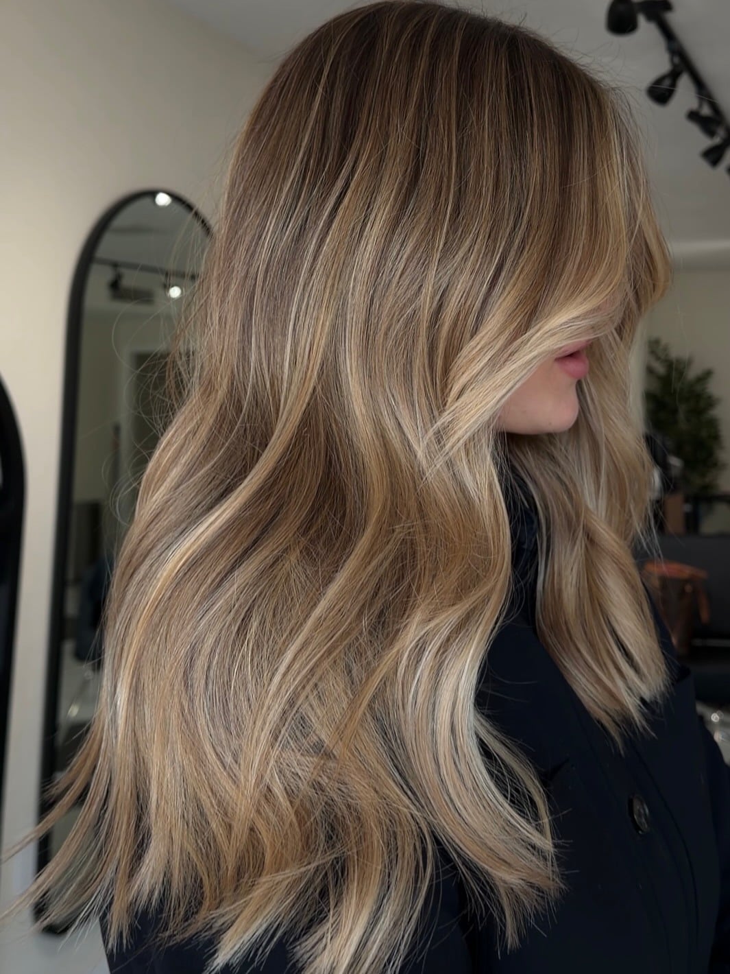 8. Dimensional Honey Blonde Layers with Face-Framing Highlights - Honey Blonde Hair with Highlights